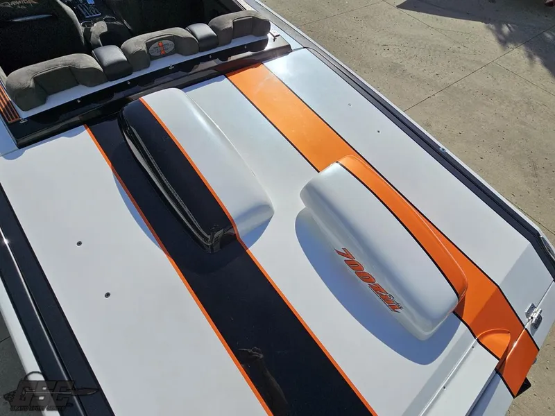 Slide: The Image of 2003 Cigarette 36 Gladiator boat with orange and black racing stripes. - 43