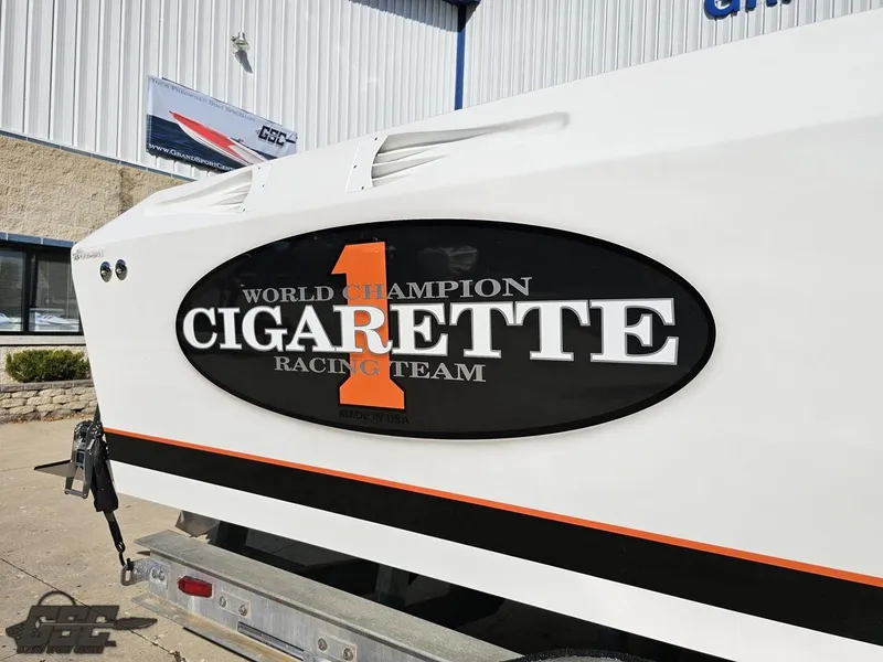 Slide: The Image of 2003 Cigarette 36 Gladiator boat with racing team logo displayed. - 6