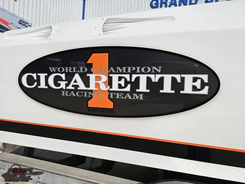 Slide: The Image of 2003 Cigarette 36 Gladiator boat with "World Champion Cigarette Racing Team" logo. - 7