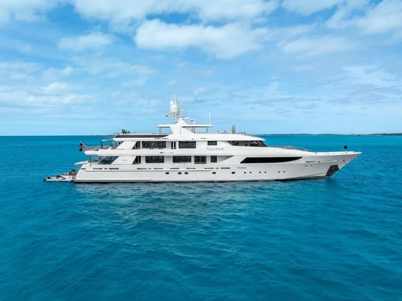 The Image of Luxurious 2013 Westport W164 yacht cruising on clear blue ocean waters. - 0