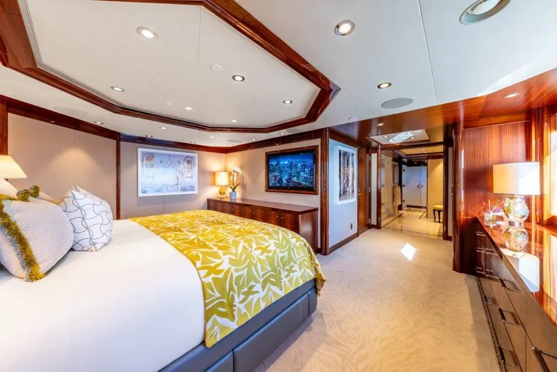 Slide: The Image of Luxurious bedroom interior on 2013 Westport W164 yacht, featuring elegant decor and modern amenities. - 18