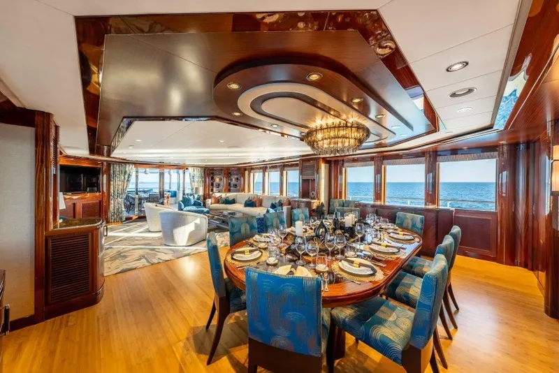 Slide: The Image of Luxurious 2013 Westport W164 yacht interior with elegant dining area and ocean view. - 27