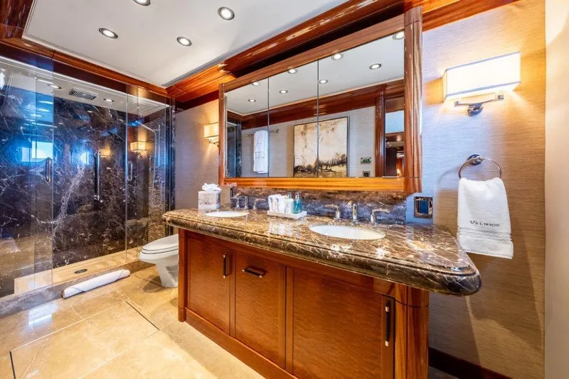Slide: The Image of Luxurious yacht bathroom with marble countertops and glass shower, Westport W164, 2013 model. - 37