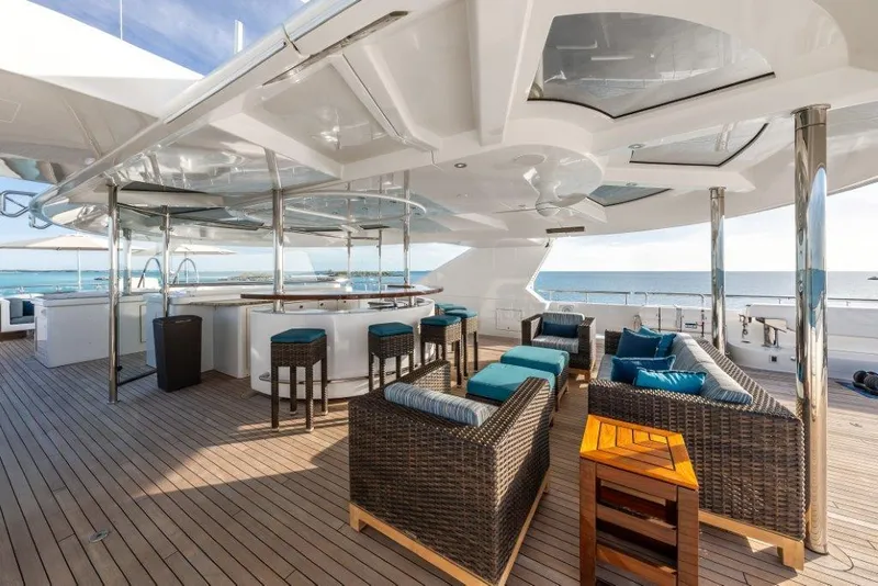 Slide: The Image of Luxurious 2013 Westport W164 yacht deck with seating and ocean view. - 7