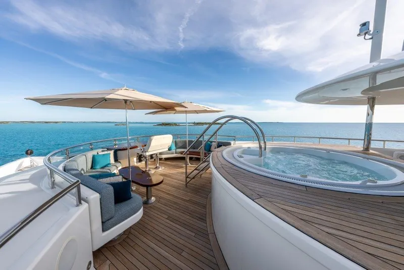 Slide: The Image of Luxurious 2013 Westport W164 yacht deck with jacuzzi and ocean view. - 8