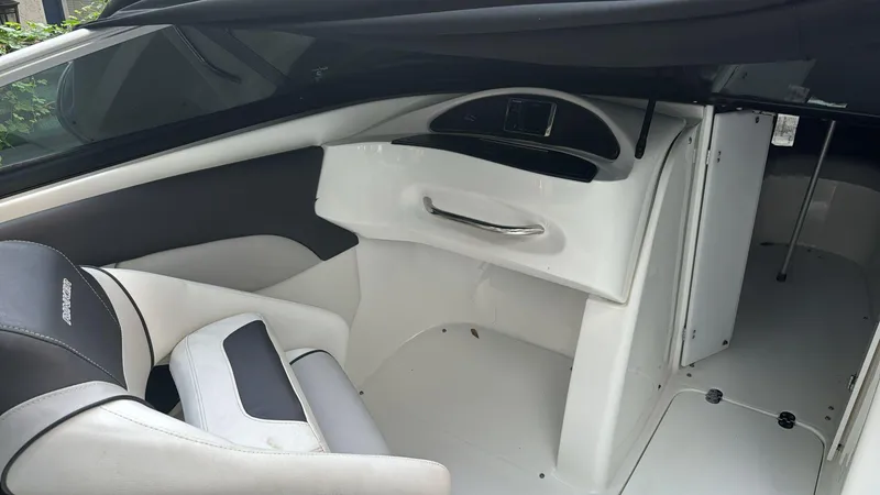 Slide: The Image of 2019 Rinker 21QX BR boat interior with sleek seating and modern design. - 9