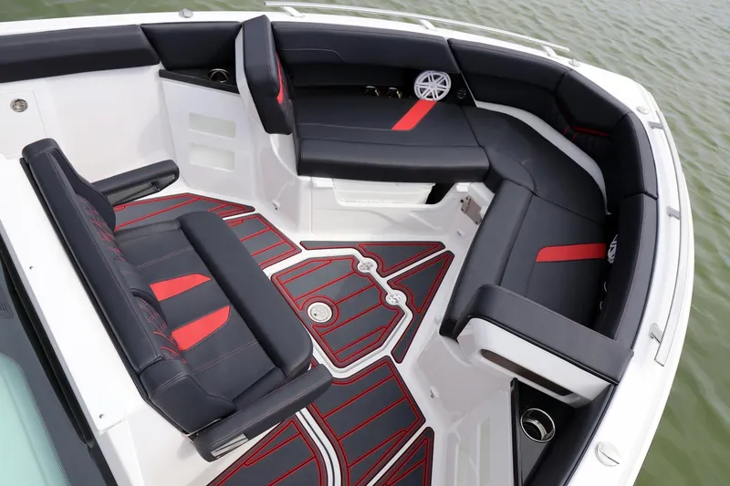 Slide: The Image of Luxurious 2025 Monterey Elite 30 OB boat interior with stylish black and red seating. - 4