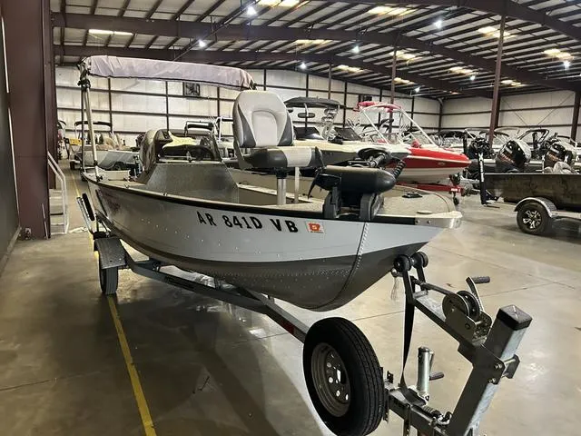 Slide: The Image of 2019 Starcraft 16 Patriot boat with Honda 30HP engine in indoor showroom. - 3