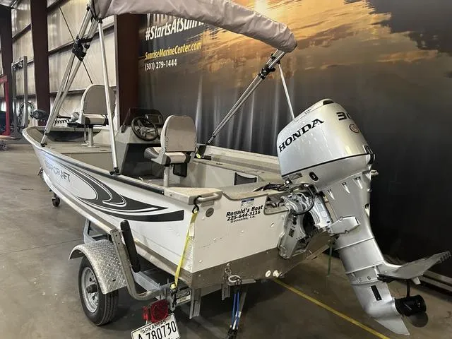 Slide: The Image of 2019 Starcraft 16 Patriot boat with Honda 30HP engine in showroom. - 5