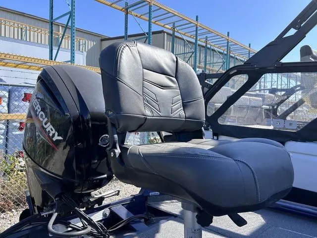 Slide: The Image of 2020 Tracker Pro Team 175 TF® boat seat and Mercury engine in sunlight. - 6
