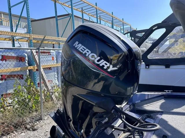 Slide: The Image of 2020 Tracker Pro Team 175 TF® with Mercury outboard motor in a storage yard. - 7