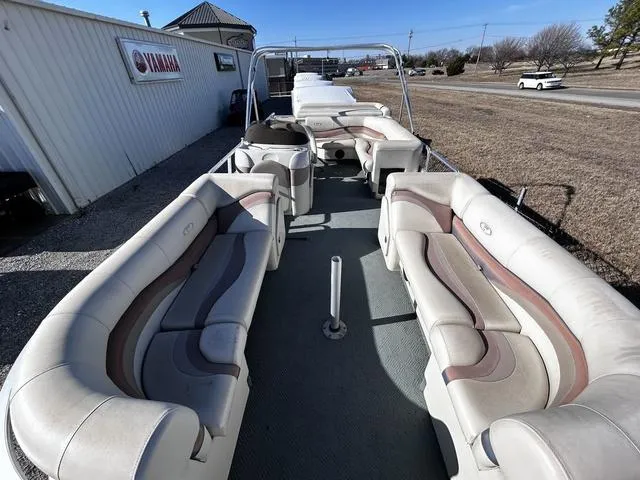 Slide: The Image of 2003 Fisher FREEDOM 240 DELUXE pontoon boat with spacious seating and modern design. - 5