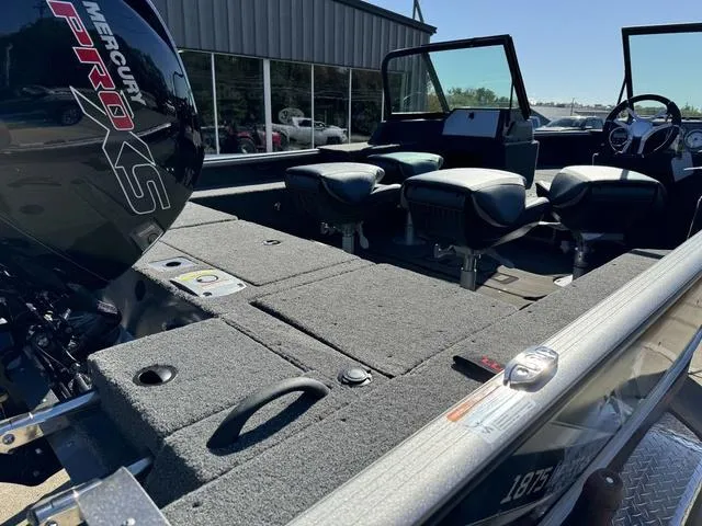 Slide: The Image of 2025 Lund 1875 Impact XS Sport boat interior with Mercury Pro XS engine. - 4