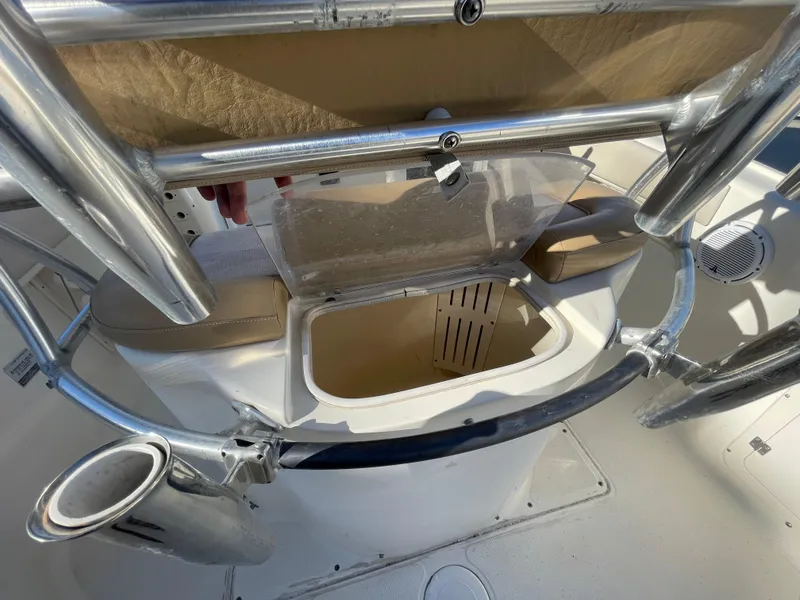 Slide: The Image of 2007 Scout 242 Sportfish boat interior with open storage compartment. - 13