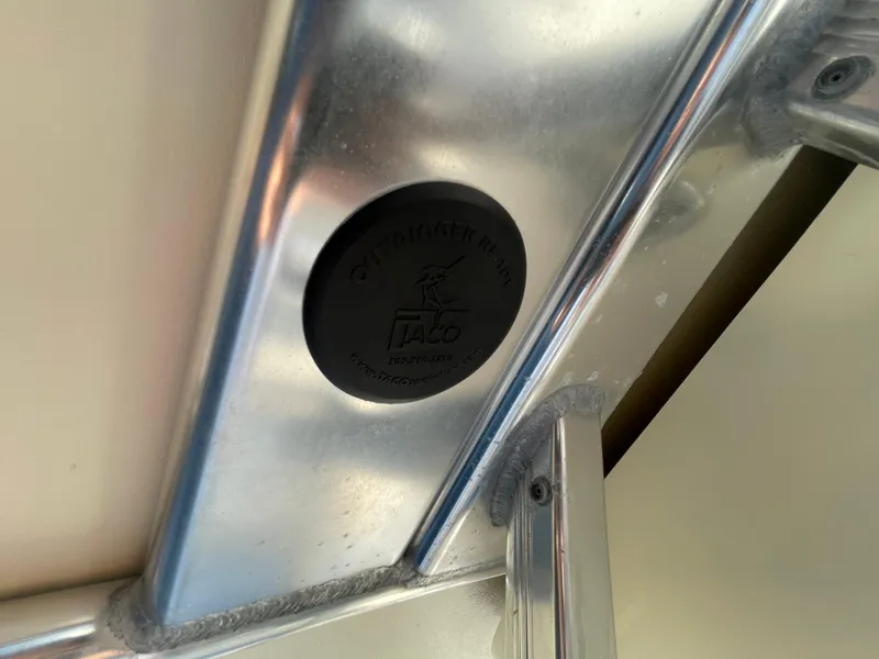 Slide: The Image of Close-up of 2007 Scout 242 Sportfish boat's metal frame with Taco Marine logo. - 20