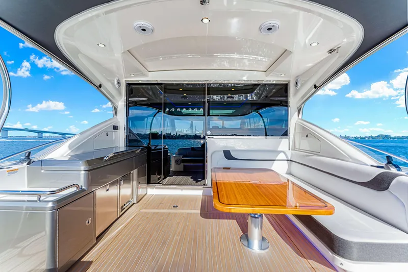 Slide: The Image of Luxurious 2025 Riviera 5400 Sport Yacht interior with sleek design and ocean view. - 29
