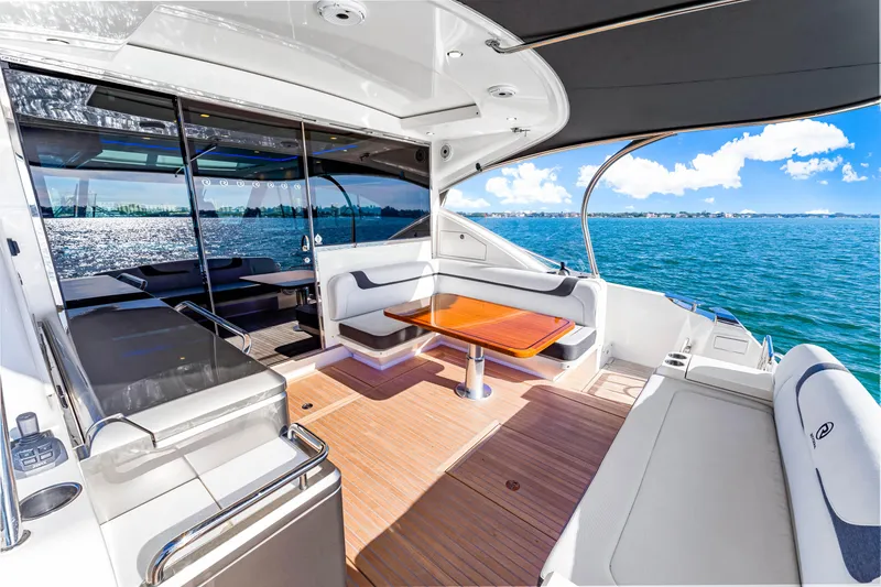 Slide: The Image of Luxurious 2025 Riviera 5400 Sport Yacht with spacious deck and stunning ocean view. - 30