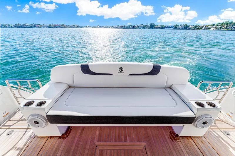Slide: The Image of 2025 Riviera 5400 Sport Yacht, luxurious seating with ocean view. - 35