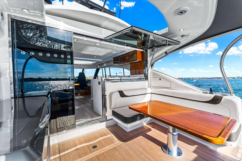 Slide: The Image of Luxurious 2025 Riviera 5400 Sport Yacht interior with ocean view and sleek design. - 38