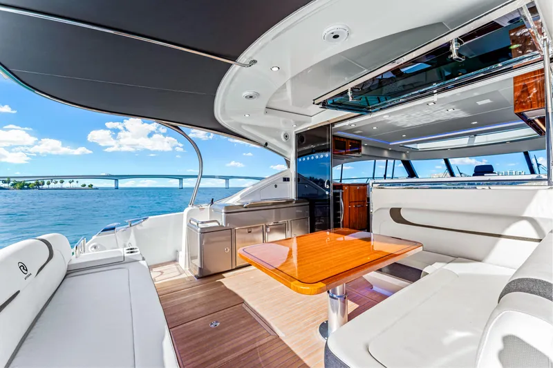 Slide: The Image of Luxurious 2025 Riviera 5400 Sport Yacht interior with ocean view and modern amenities. - 49