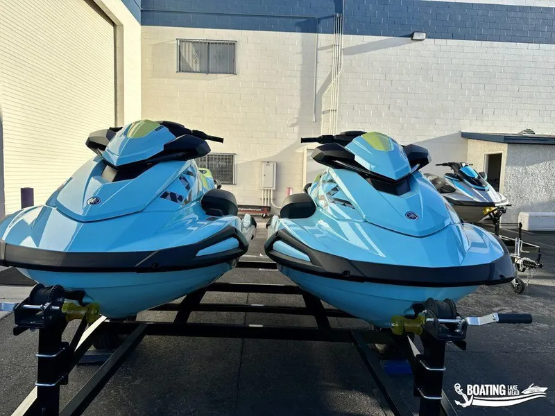 Slide: The Image of 2025 Yamaha WaveRunner VX Limited Ho jet skis on trailers, parked outdoors. - 10