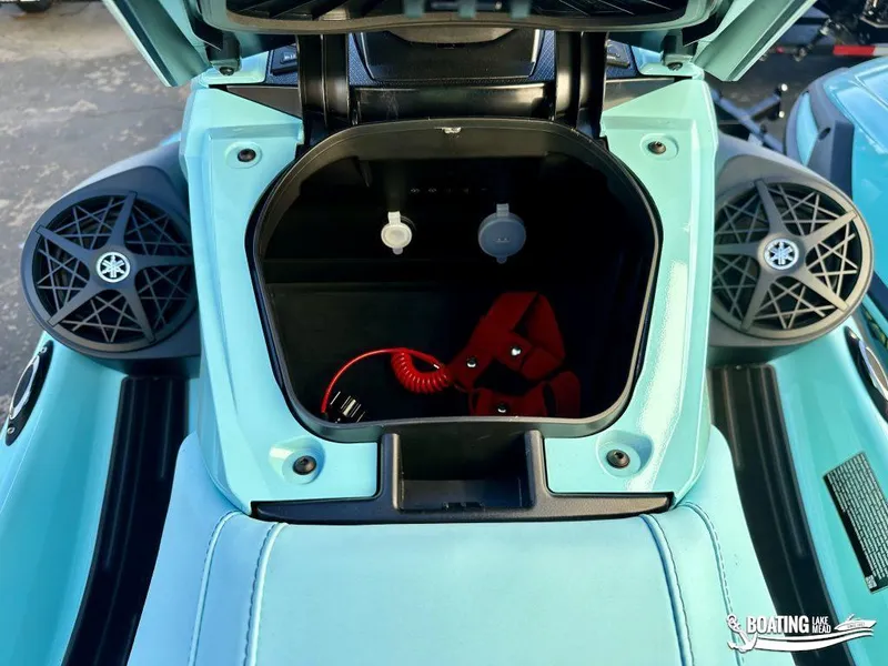 Slide: The Image of 2025 Yamaha WaveRunner VX Limited Ho storage compartment with speakers and safety gear. - 3
