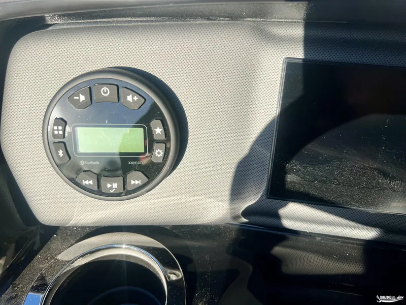 Slide: The Image of 2025 Yamaha AR195 boat dashboard with Bluetooth stereo controls. - 8