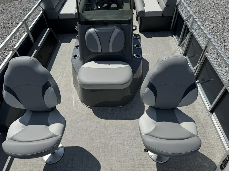 Slide: The Image of 2025 Tahoe Pontoon Sport 85 center console with gray seating and modern design. - 8