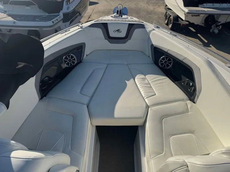 Slide: The Image of Luxurious interior of a 2015 Monterey 288SS boat with white leather seating. - 3