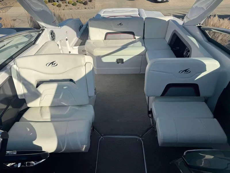 Slide: The Image of 2015 Monterey 288SS boat interior with white leather seating and modern design. - 5