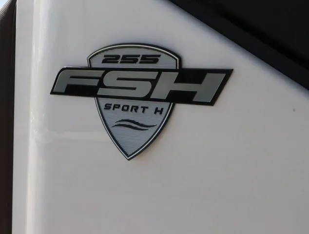 Slide: The Image of 2025 Yamaha Boats 255 FSH SPORT H-SEAFOAM G logo on white surface. - 17