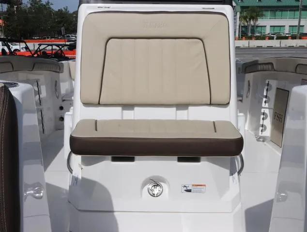 Slide: The Image of 2025 Yamaha Boats 255 FSH SPORT H-SEAFOAM G, beige seating, sleek design. - 22