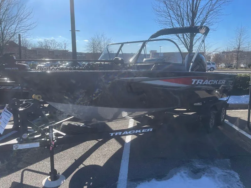 The Image of 2025 Tracker Targa V-19 Combo boat on trailer in parking lot. - 0