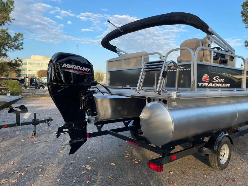 Slide: The Image of 2025 Sun Tracker Party Barge 16 DLX pontoon boat with Mercury outboard motor. - 48