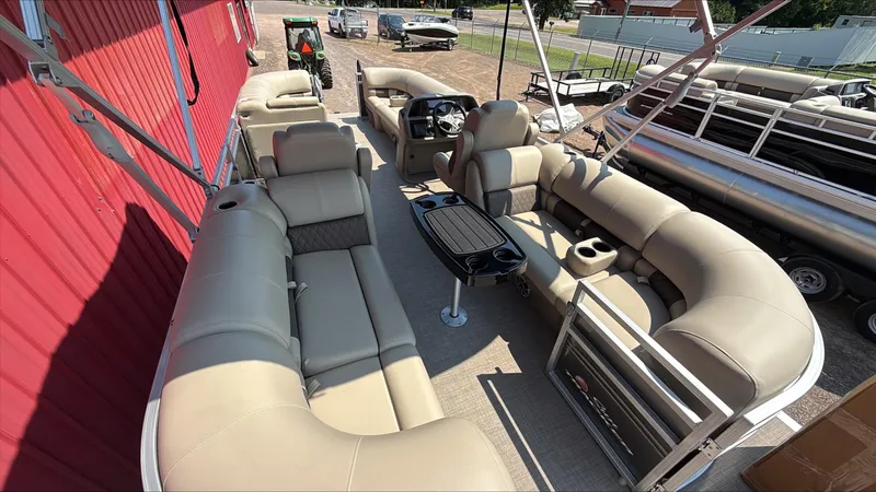 Slide: The Image of 2025 Sun Tracker Party Barge 22 DLX with spacious seating and modern amenities. - 2