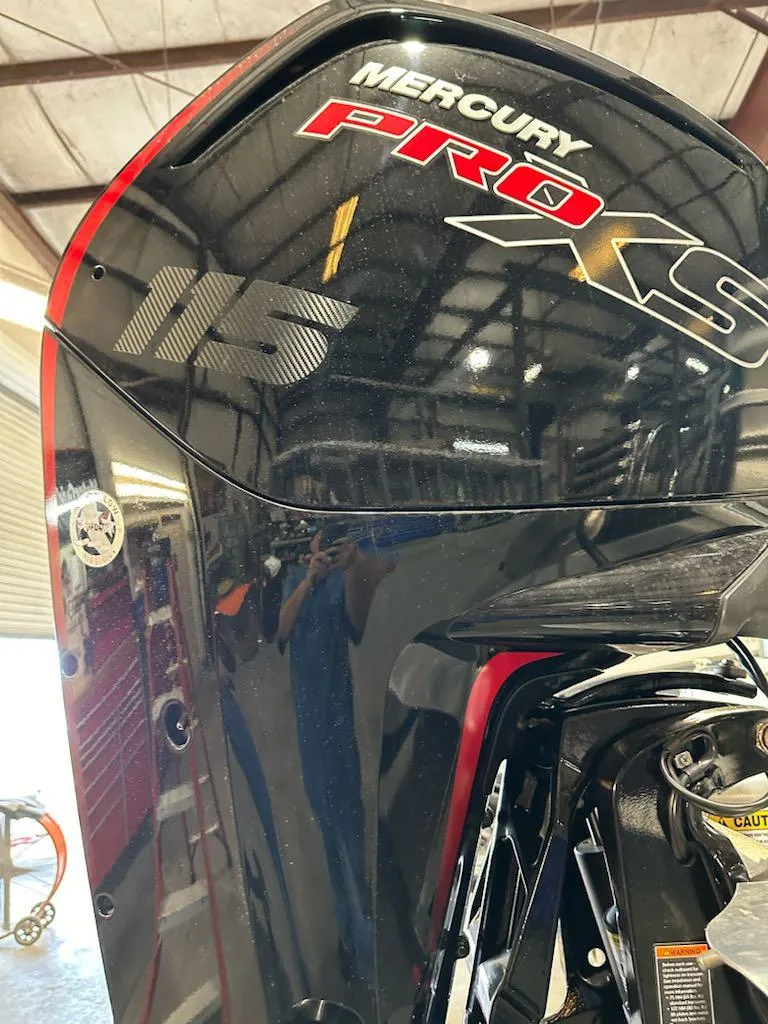 Slide: The Image of Mercury Pro XS outboard motor on 2025 Sun Tracker Fishin' Barge 20 DLX. - 4