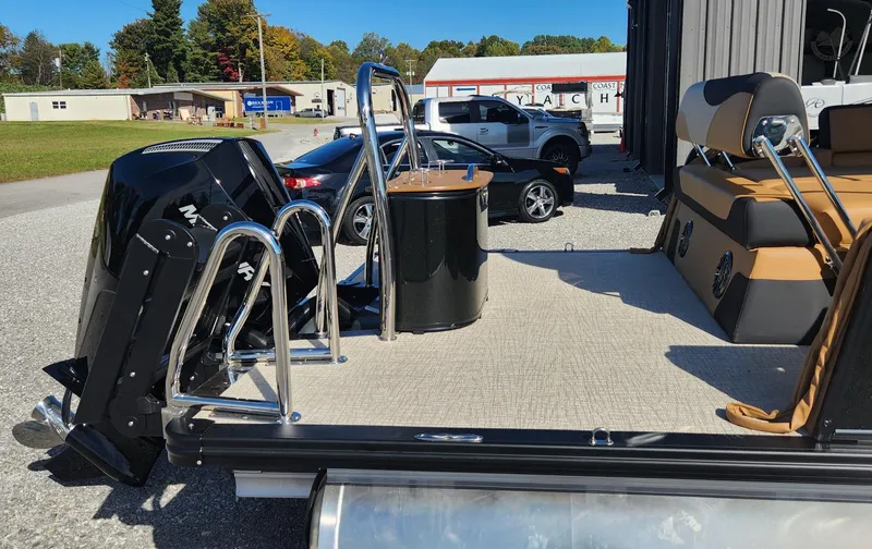 Slide: The Image of 2025 Avalon Platinum LSZ 2385 Cruise Rear Bench pontoon boat with motor and seating. - 11