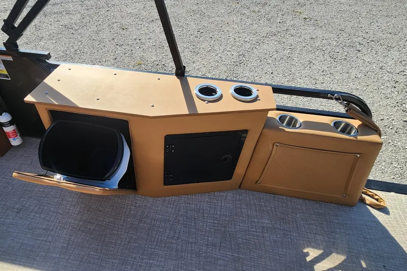 Slide: The Image of 2025 Avalon Platinum LSZ 2385 Cruise Rear Bench with cup holders and storage compartments. - 14