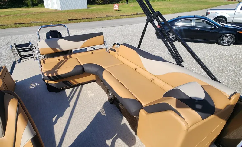 Slide: The Image of 2025 Avalon Platinum LSZ 2385 Cruise Rear Bench with tan and black seating. - 7