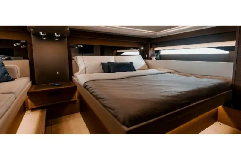 Slide: The Image of Luxurious cabin interior of 2025 Wellcraft 44 Explorer yacht with modern bedding. - 11