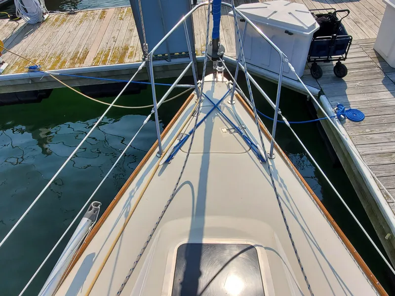Slide: The Image of Bow of 1987 Pearson 31-2 sailboat docked at marina. - 3
