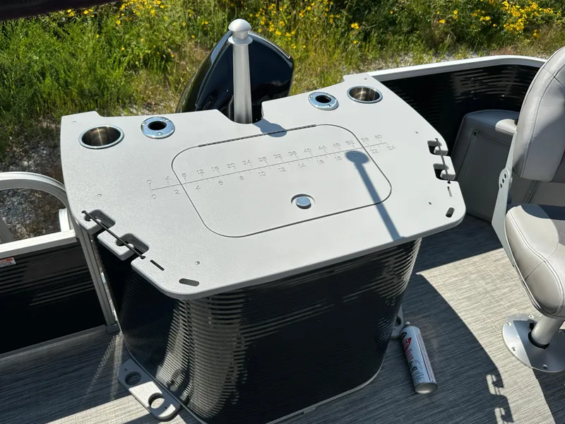 Slide: The Image of Bennington SX 20 SFX 2020 boat console with cup holders and seating. - 20