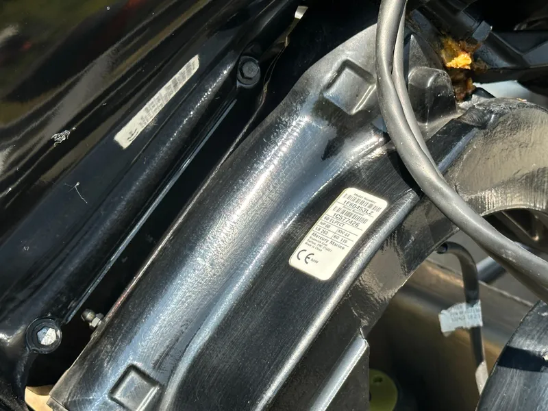 Slide: The Image of Close-up of 2020 Bennington SX 20 SFX engine components and labels. - 4