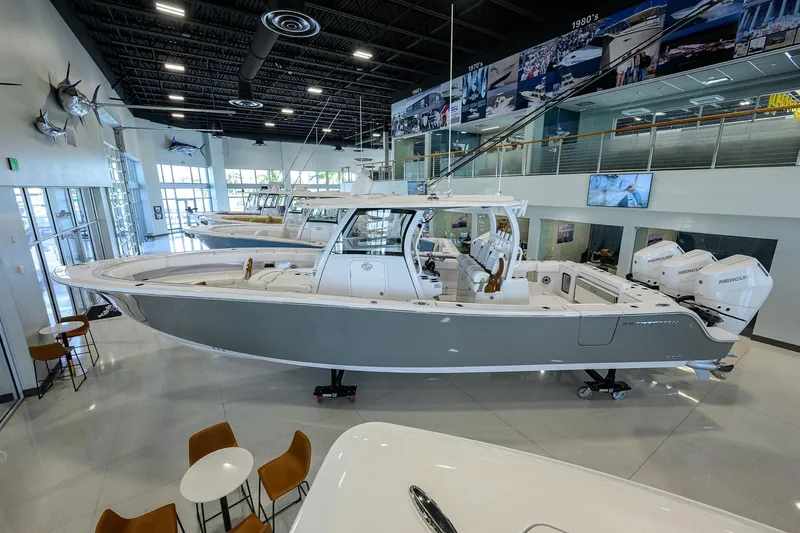 The Image of 2025 Sportsman Open 352 boat displayed in a showroom with modern interior design. - 1