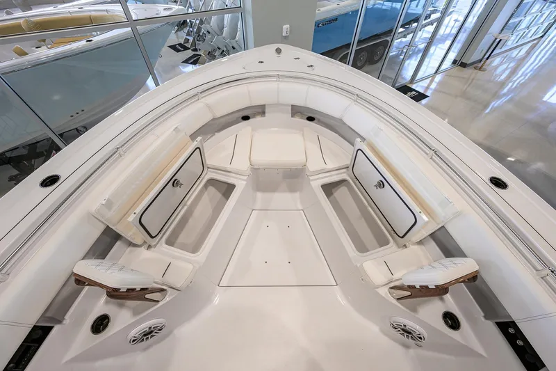 Slide: The Image of 2025 Sportsman Open 352 boat interior with seating and storage compartments. - 13