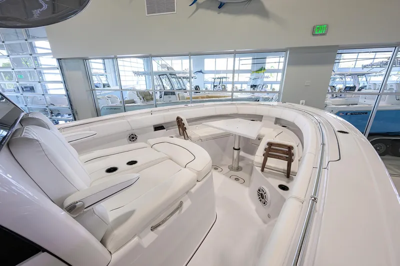 Slide: The Image of 2025 Sportsman Open 352 boat interior with white seating and modern design. - 17