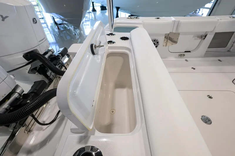 Slide: The Image of 2025 Sportsman Open 352 boat interior with open storage compartment. - 36