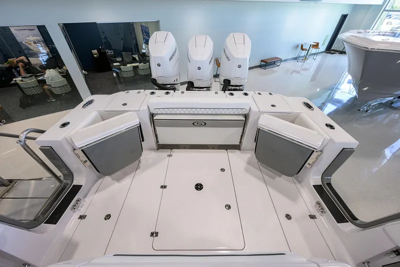 Slide: The Image of 2025 Sportsman Open 352 boat with triple engines, spacious deck, and modern design. - 37