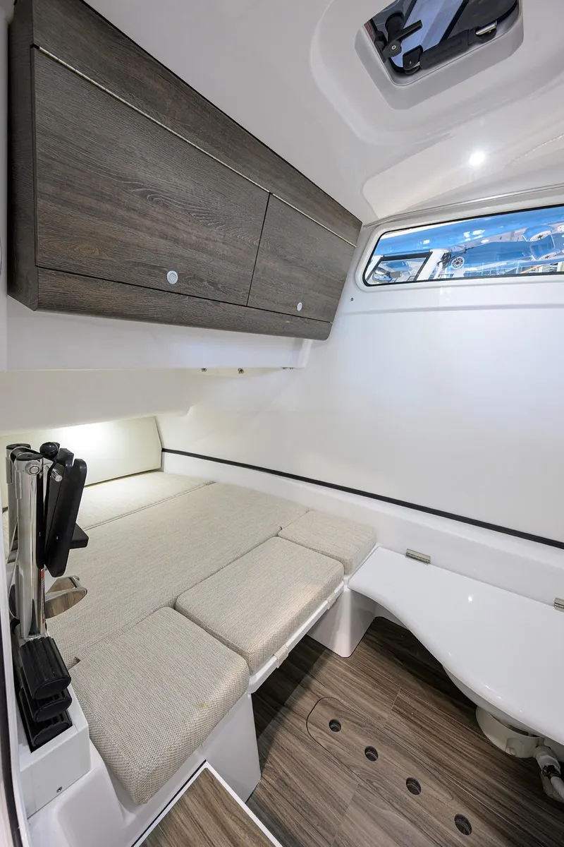 Slide: The Image of 2025 Sportsman Open 352 cabin interior with modern design, wood accents, and comfortable seating. - 39