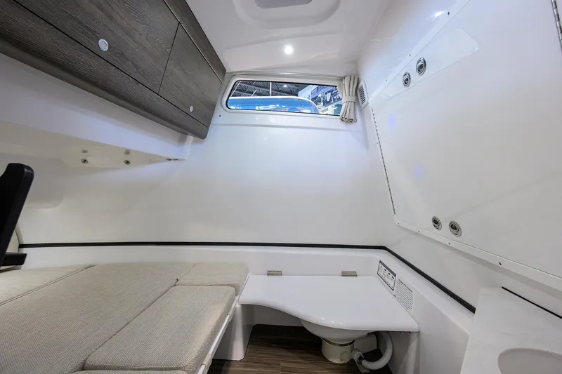 Slide: The Image of 2025 Sportsman Open 352 cabin interior with modern design and comfortable seating. - 41